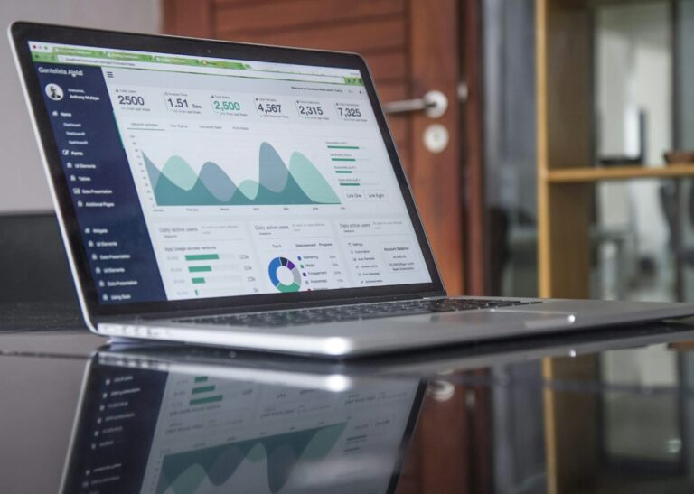 Laptop displaying a business web application dashboard